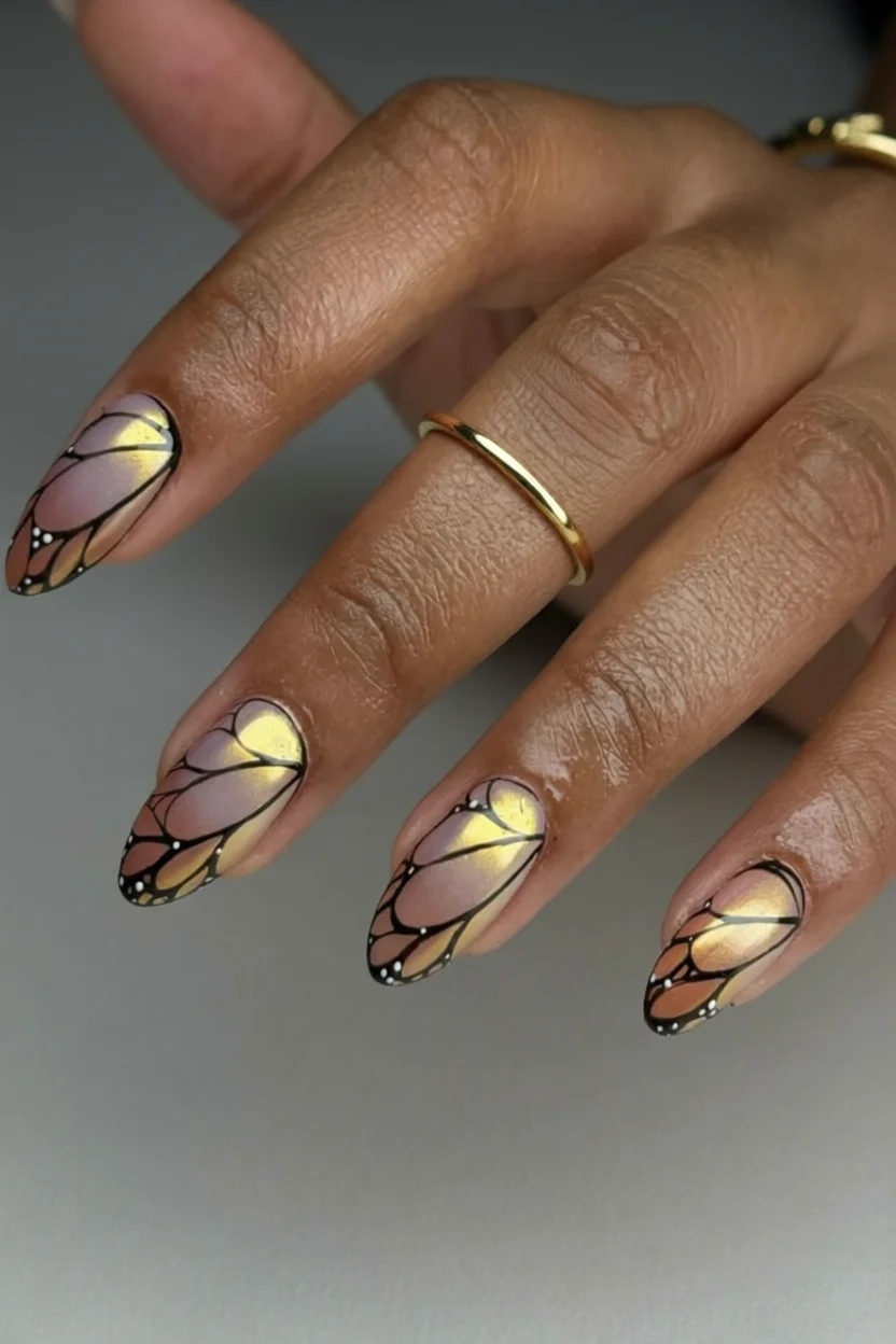 20 Uñas de mariposas que convierten una manicura sencilla en un diseño delicado, 12